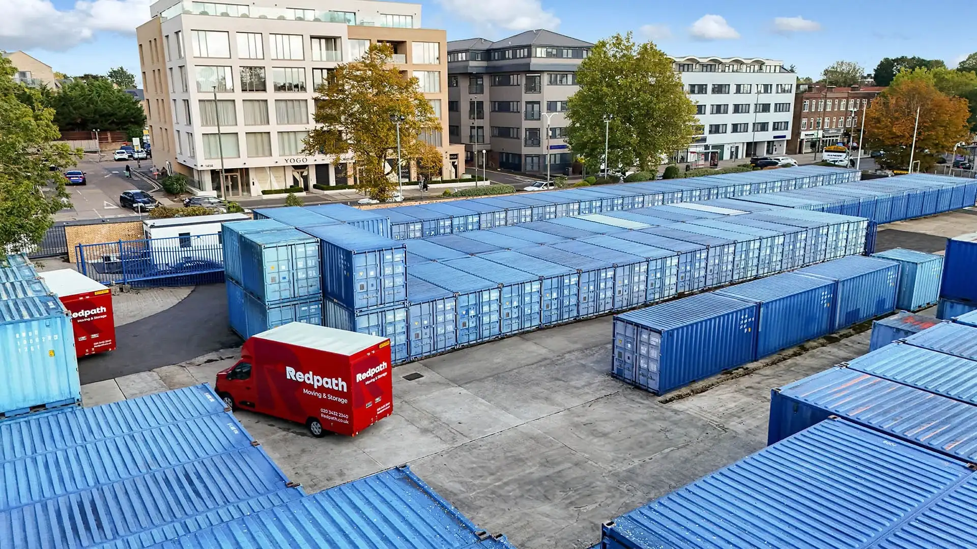 Secure storage containers stacked inside a clean warehouse