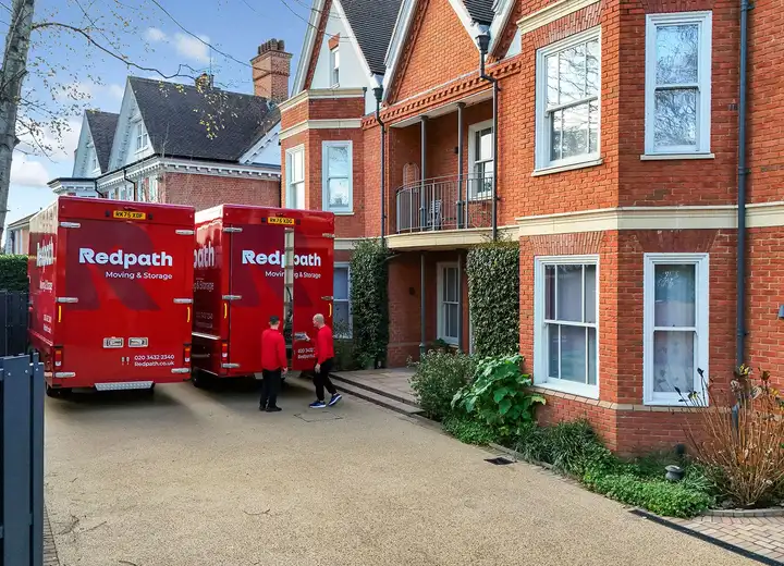 Redpath removals team loading boxes for a house move in North London
