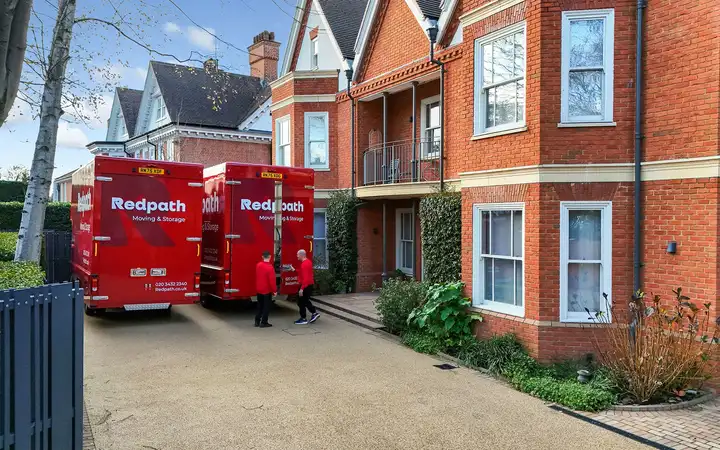 Redpath removals team loading boxes for a house move in North London