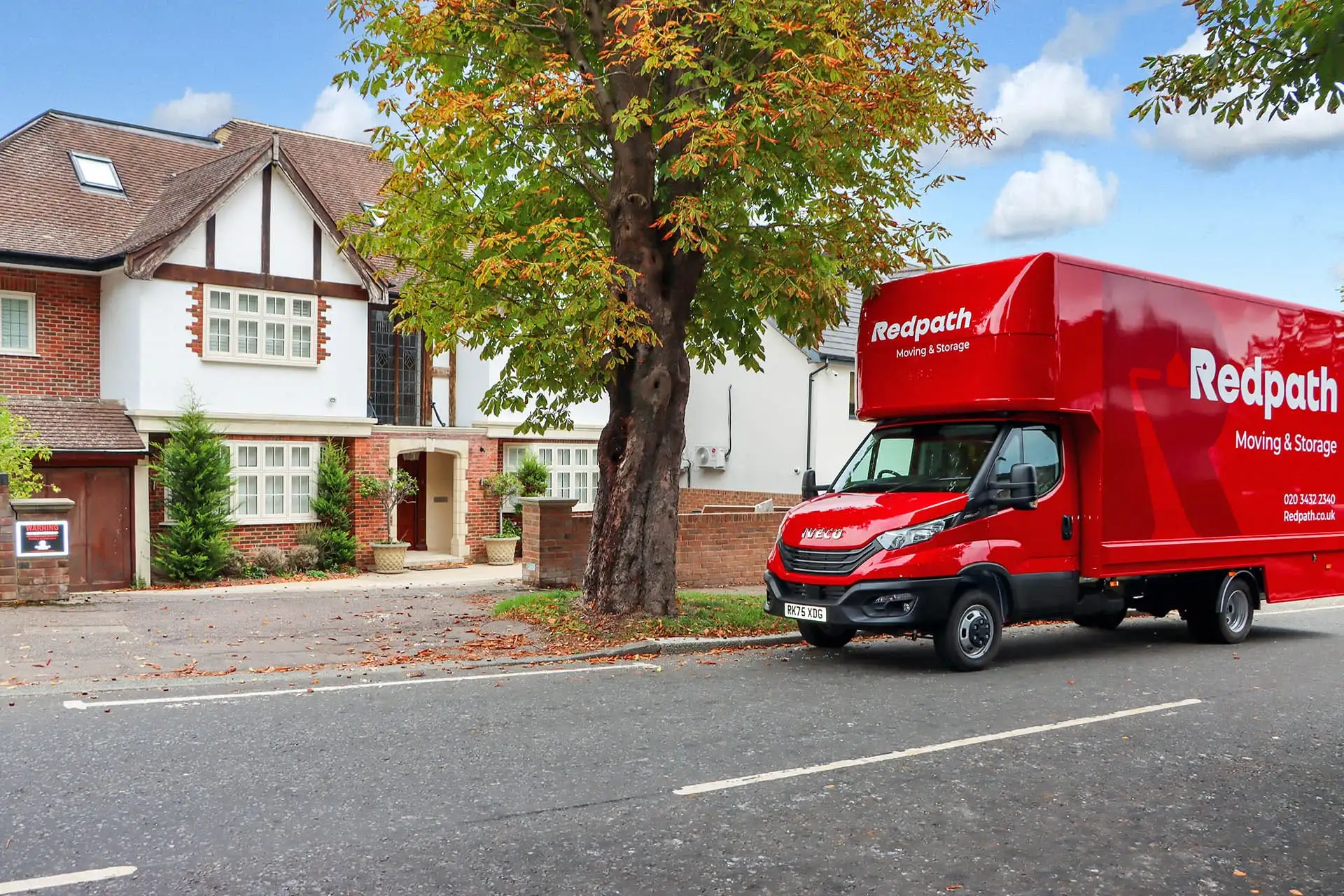Redpath removals vehicle outside a London home