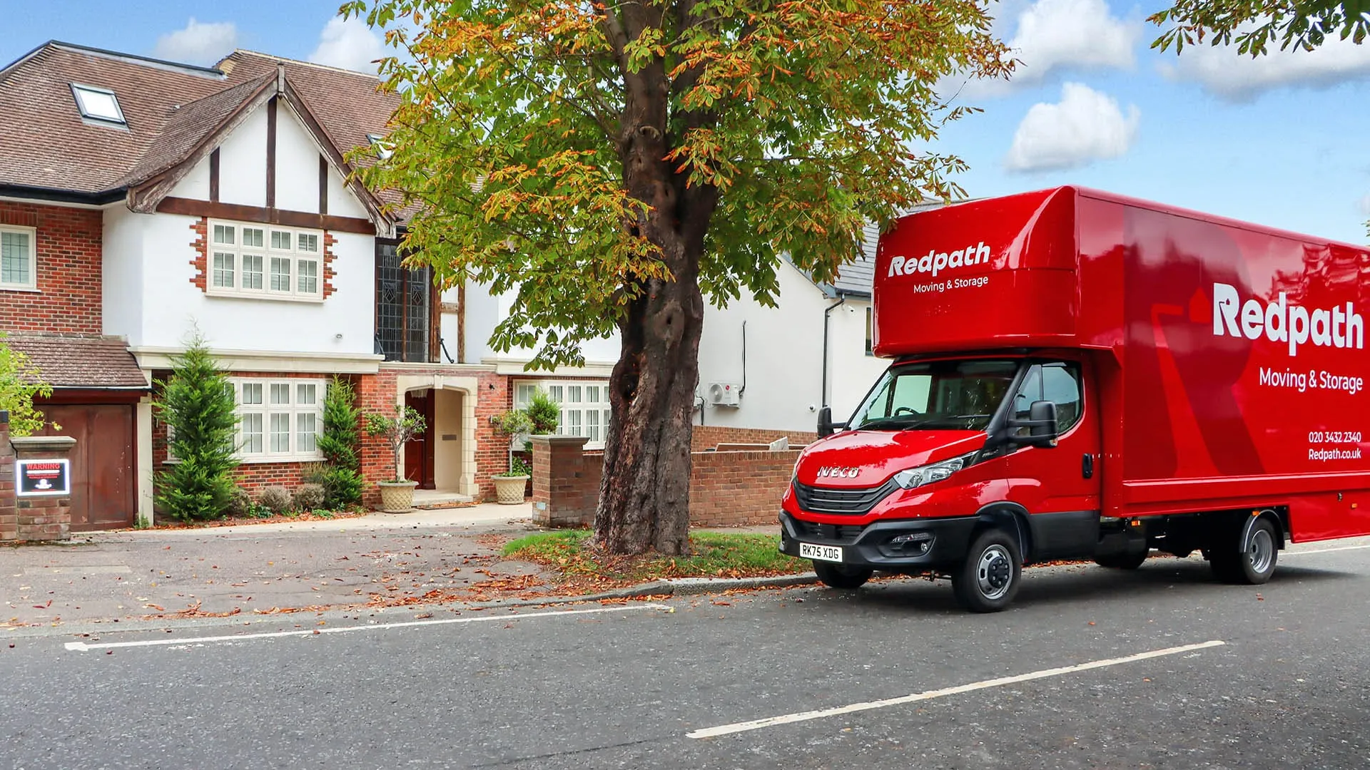 Redpath Moving & Storage truck parked outside a London student house